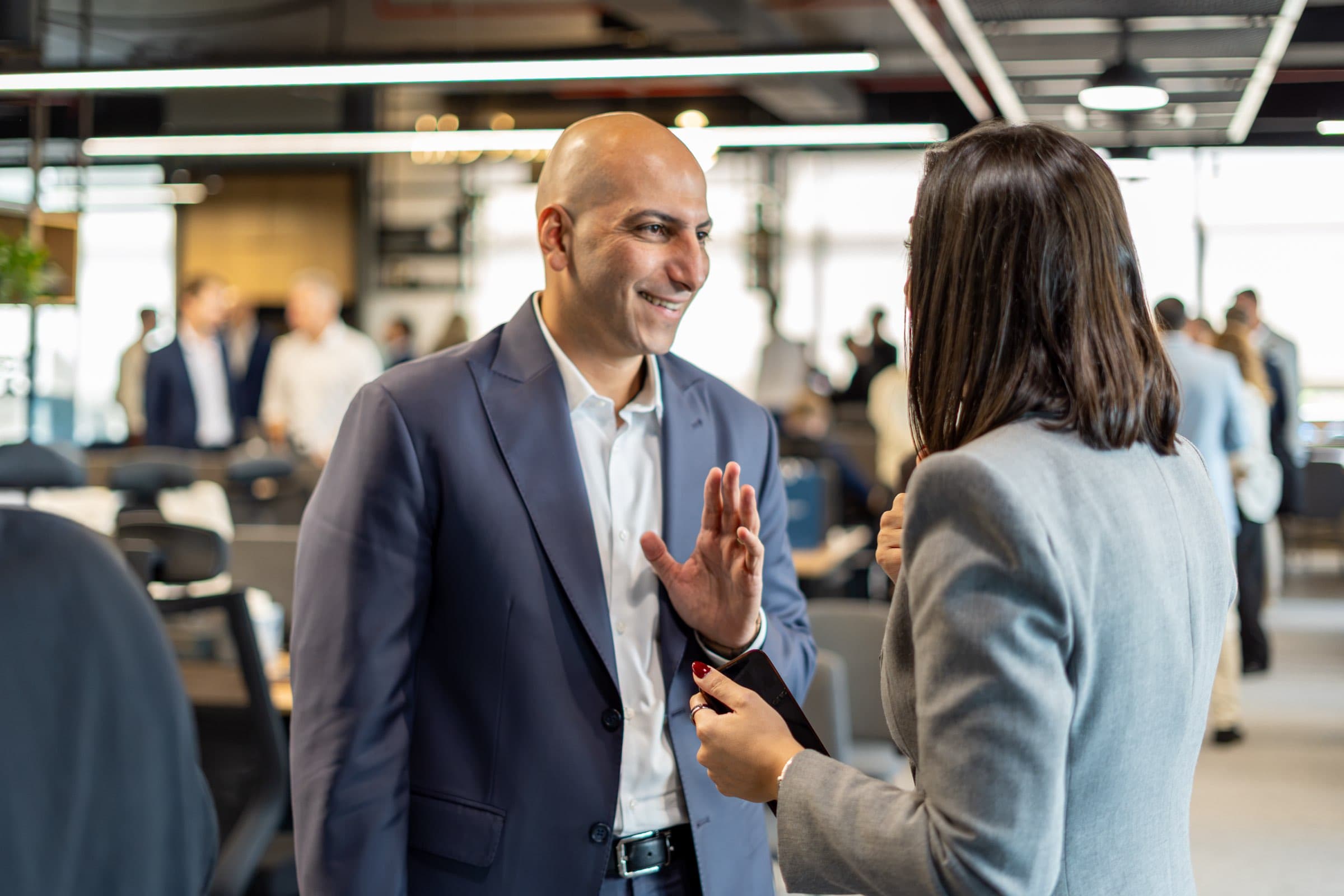 A buyer in conversation with a McCone agent