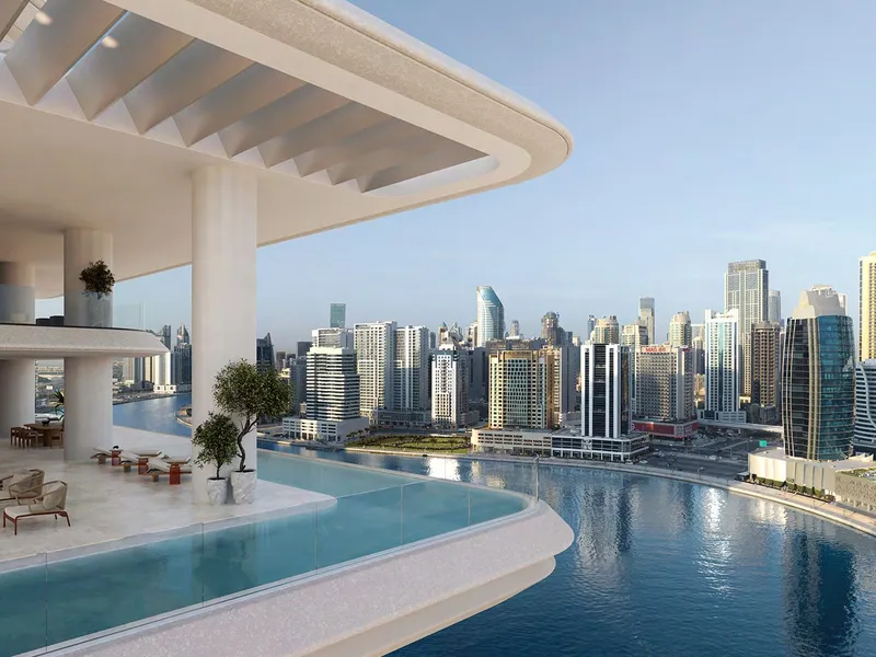 Terrace with infinity pool overlooking Marasi Bay and the Burj Khalifa