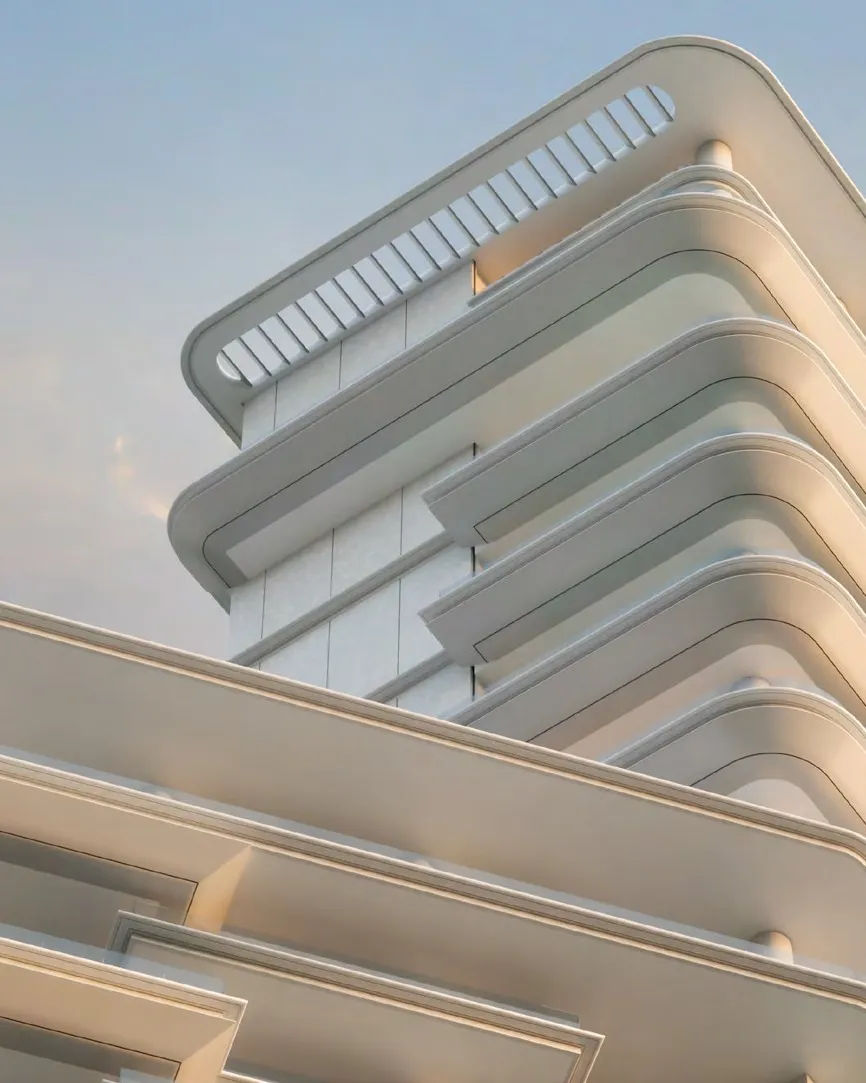 Curved terraces of VELA's crown against a soft evening sky