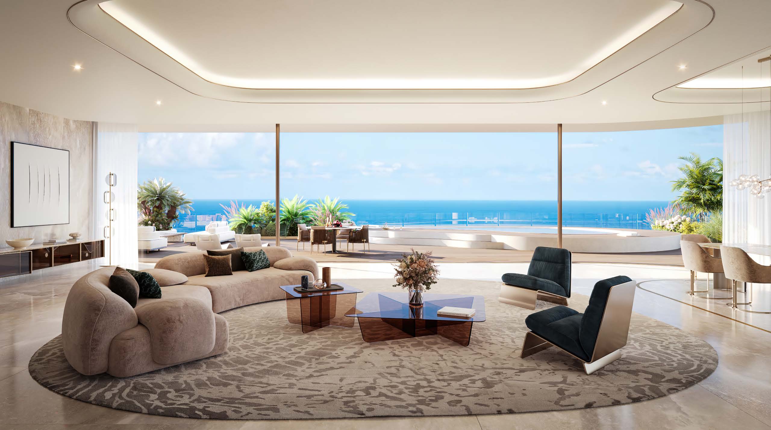 Penthouse living room opening onto a terrace and blue sea