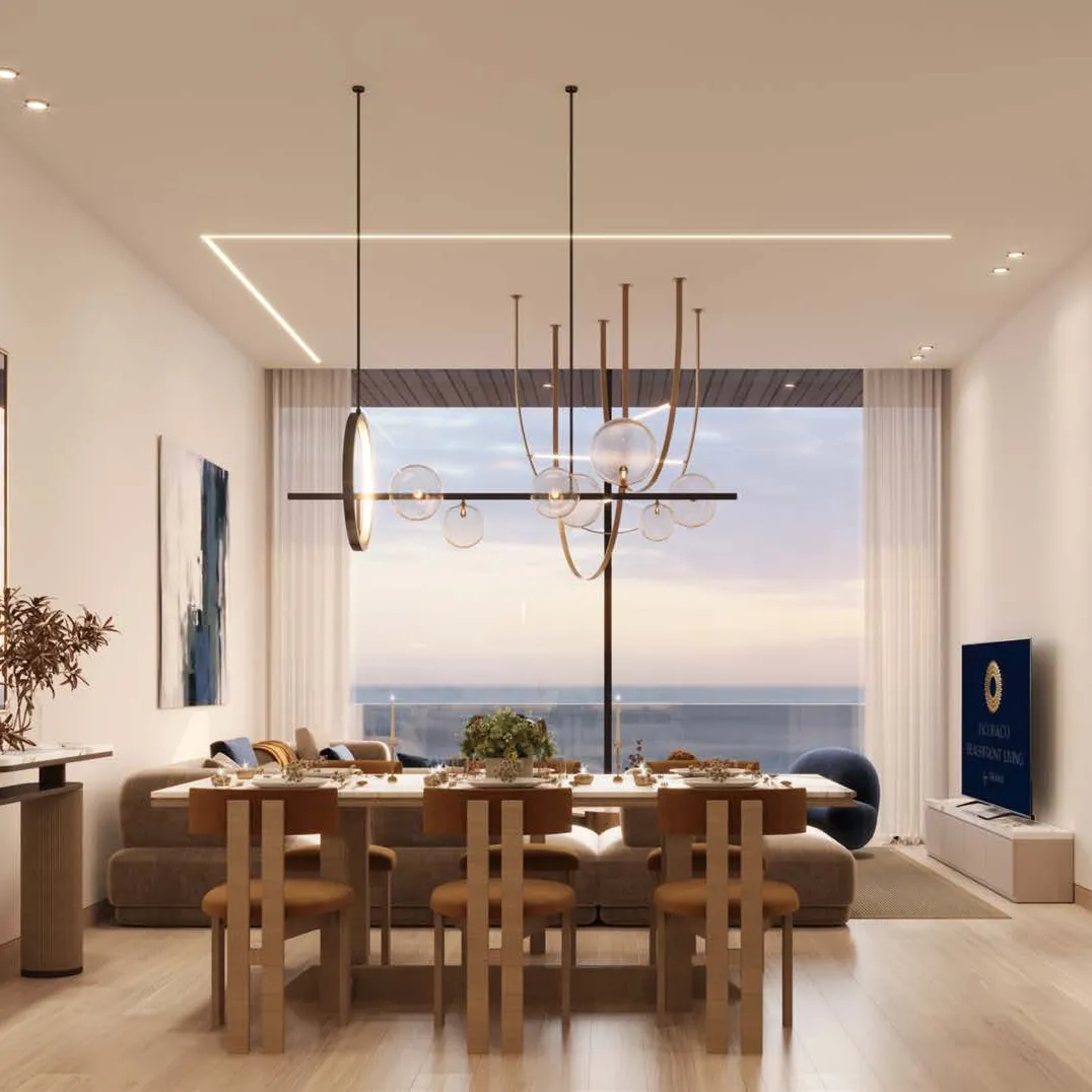 Apartment dining and living room with a tall window to the sea