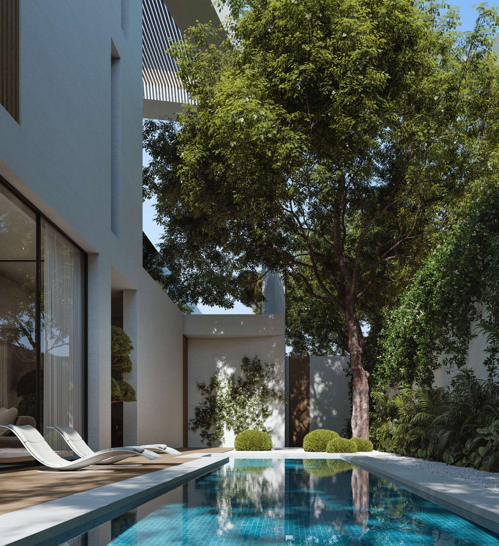 Bright living area with cream sofas, sculptural chairs and leafy plants