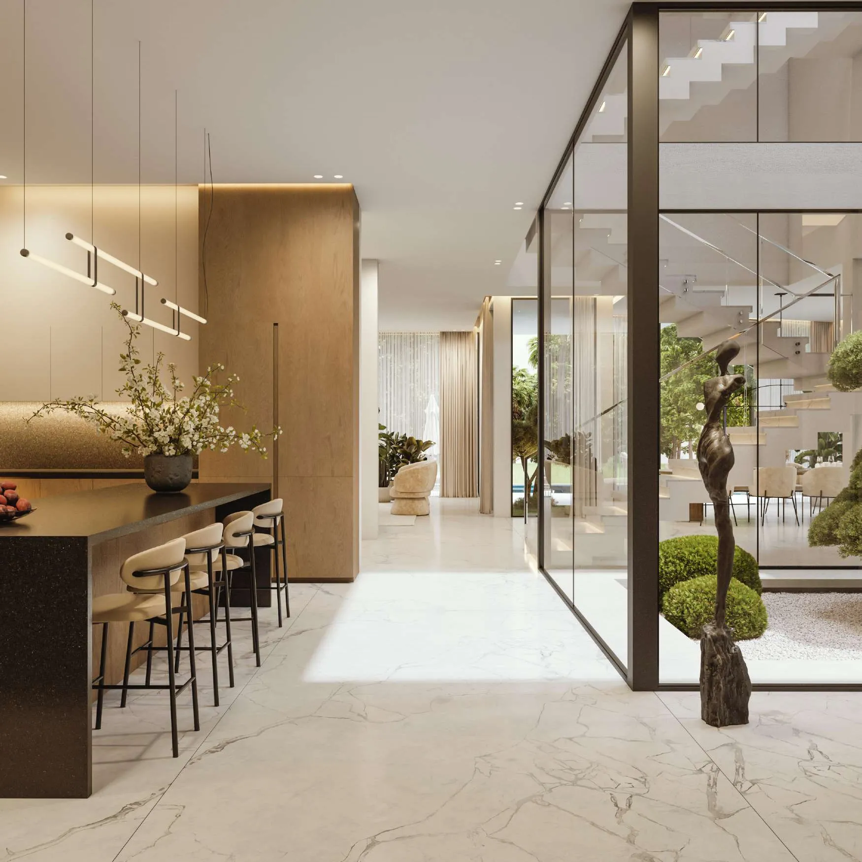 Marble-floored kitchen with island beside a glazed atrium and stairs