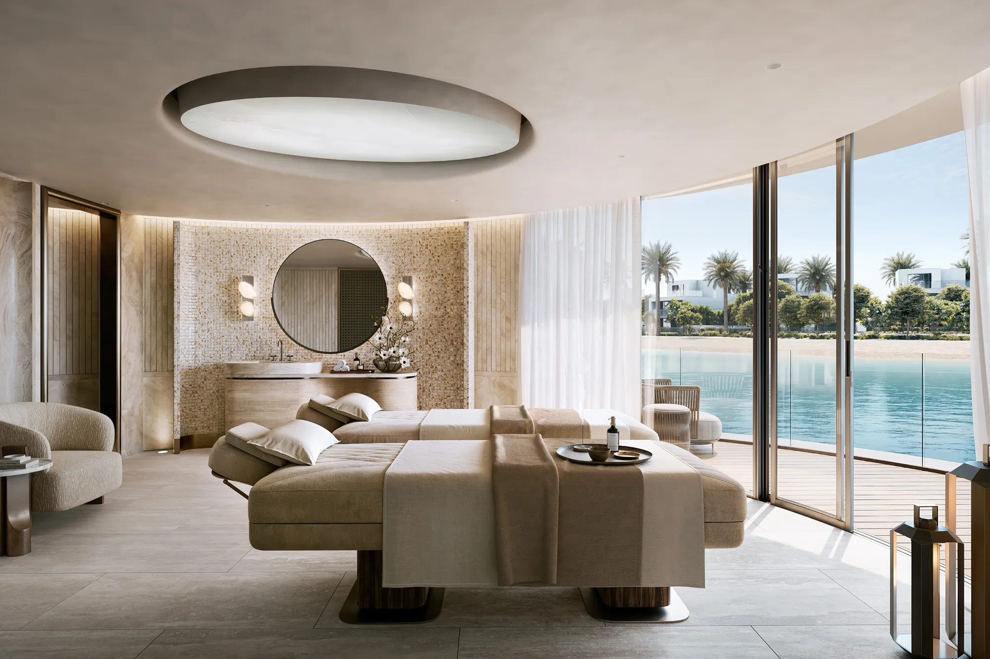 Twin treatment beds in a spa room opening onto the lake