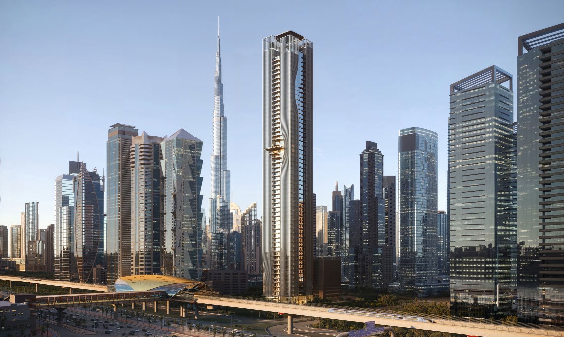 Berkeley Tower rising beside the metro line with Burj Khalifa behind