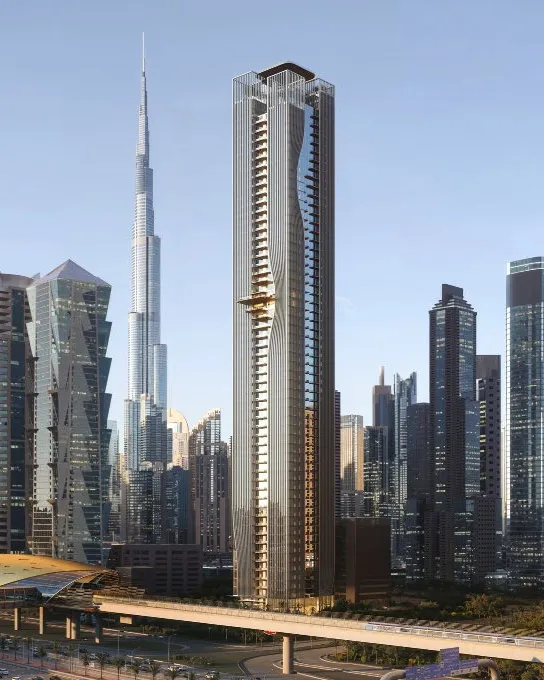 Berkeley Tower rising beside the metro line with Burj Khalifa behind