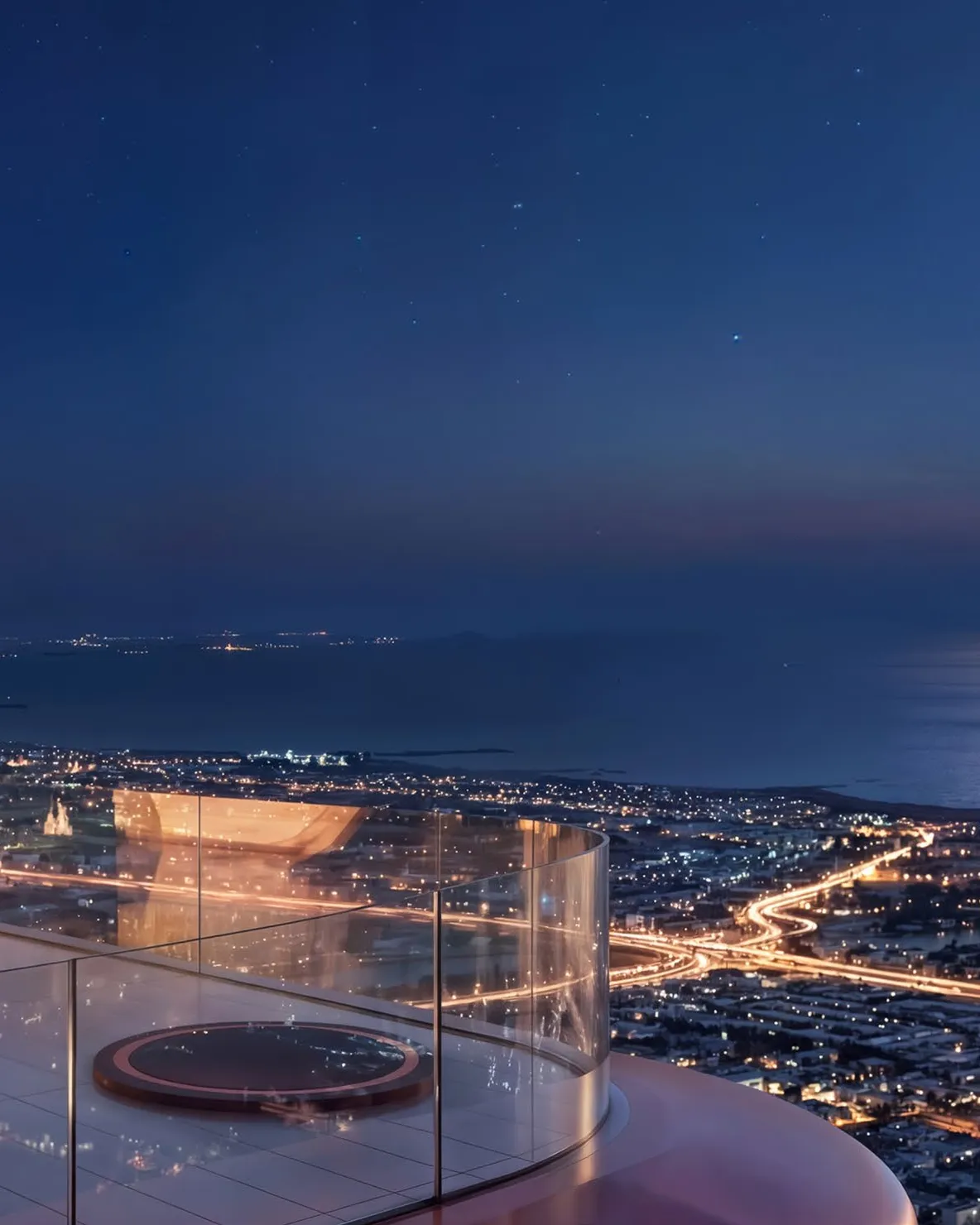 Glass-edged terrace with fire bowl above the city at night