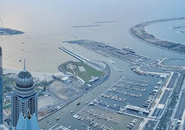 Aerial panorama of Dubai Marina, Dubai Harbour, Ain Dubai and the Palm