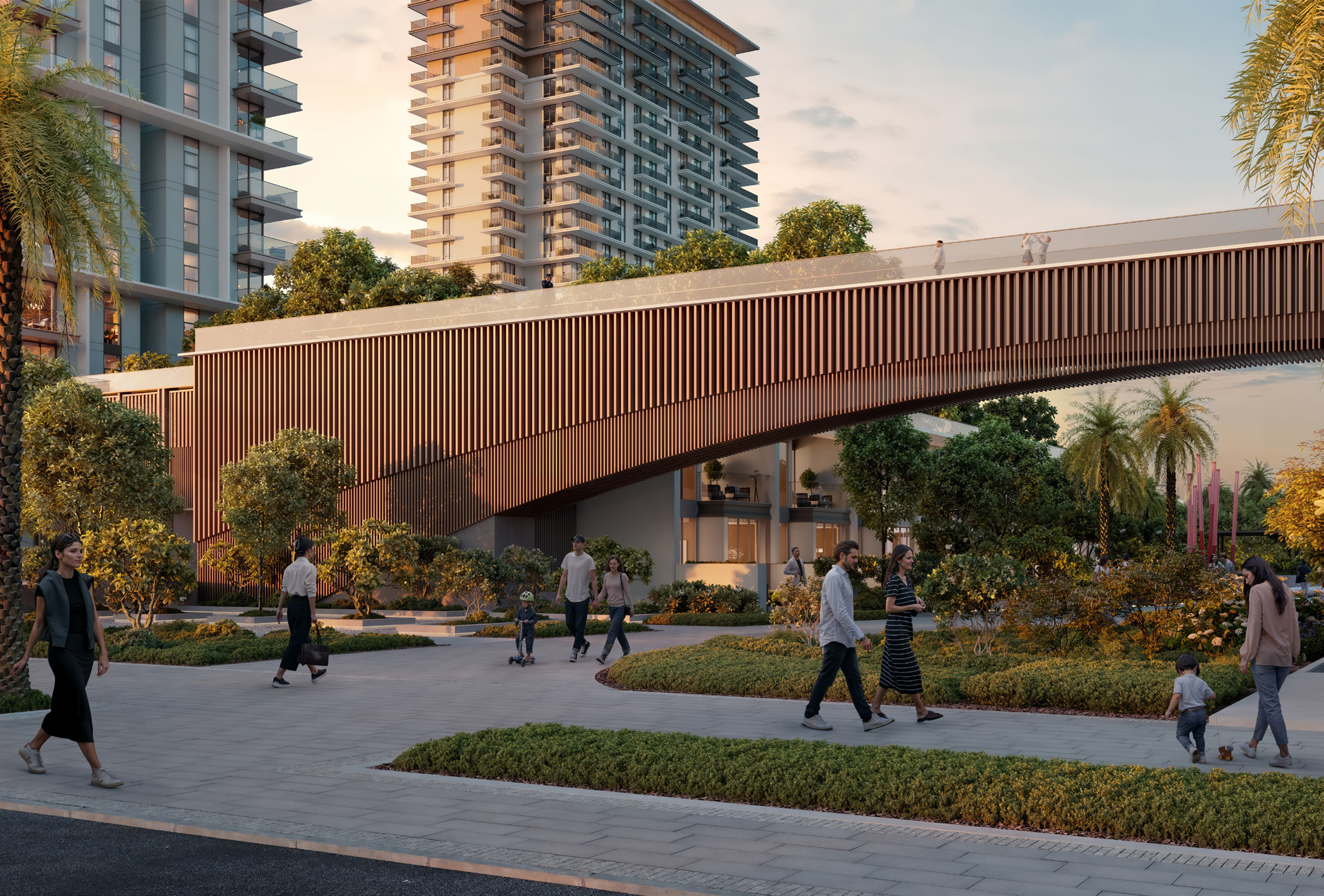 Timber-clad footbridge above a landscaped promenade with people walking