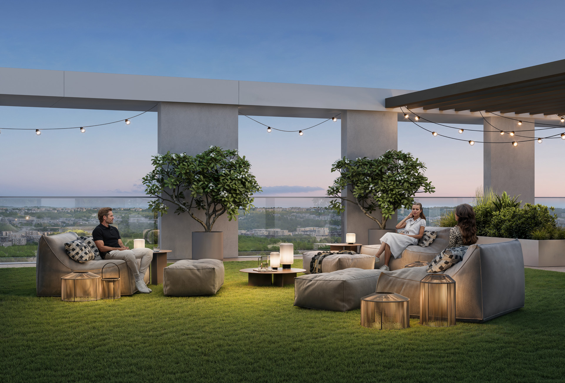 Rooftop lawn with lounge chairs, lanterns and string lights at twilight