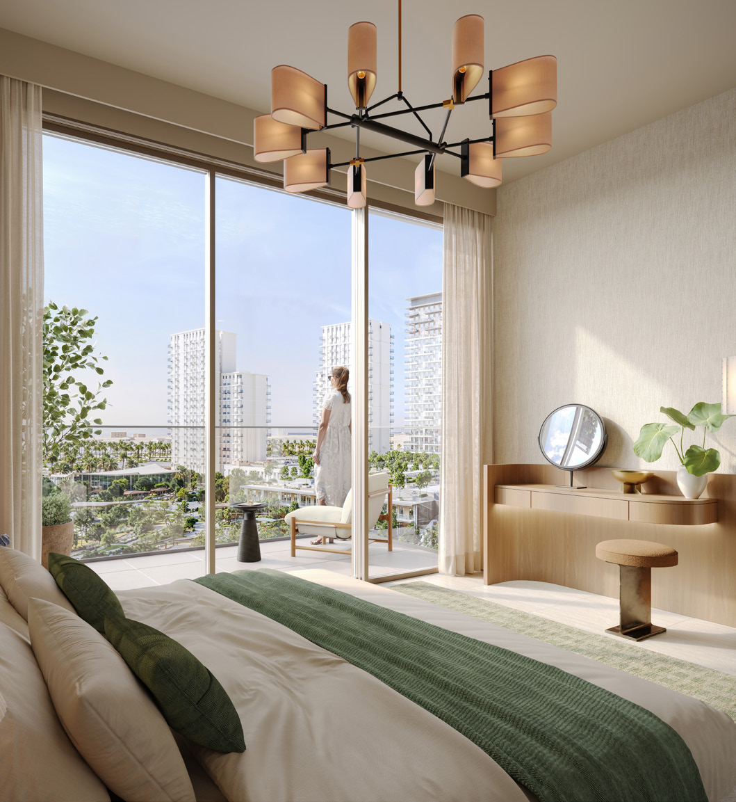 Bedroom with floor-to-ceiling windows opening onto a balcony with green views