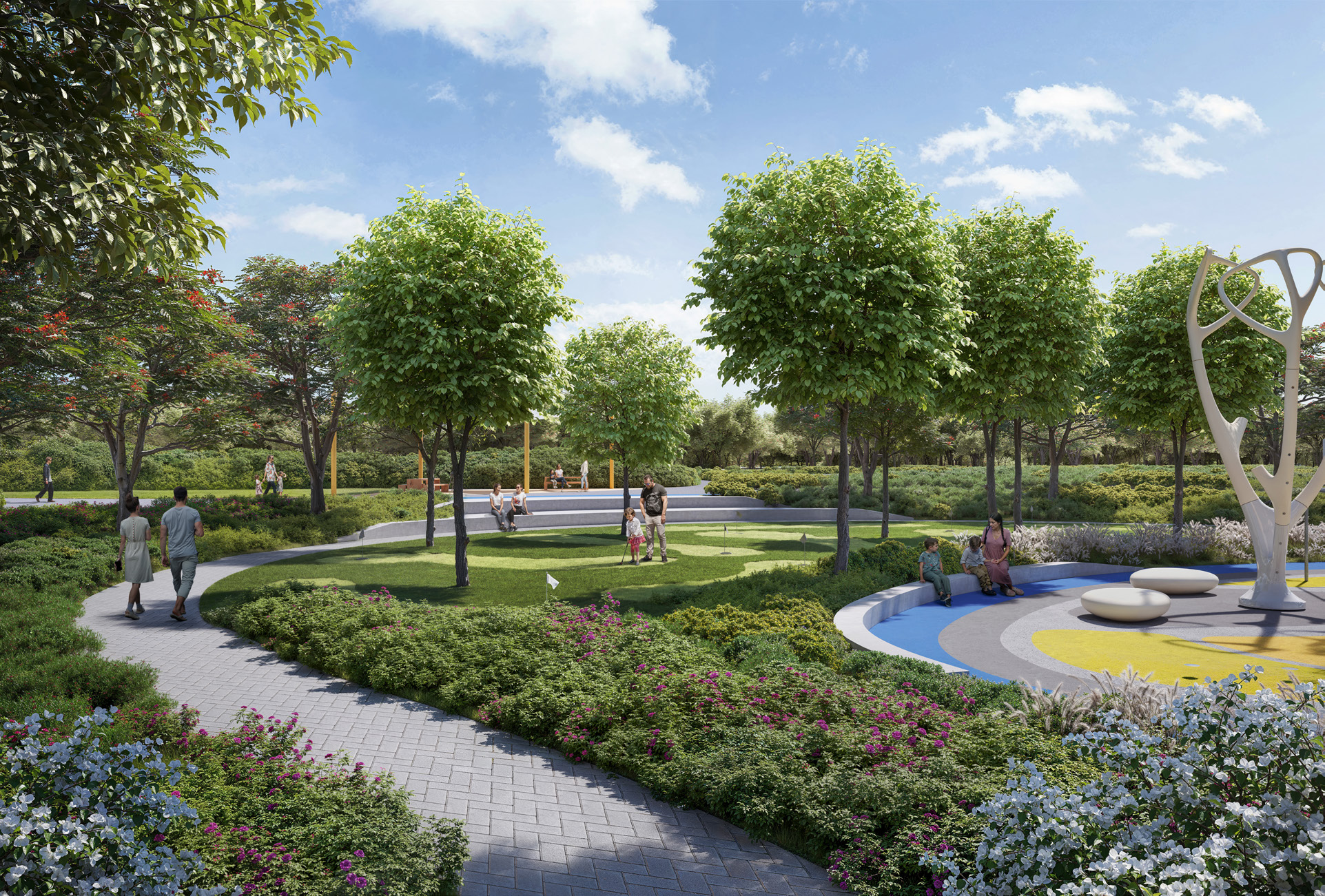 Winding garden path through flowering planting, lawns and trees in the park