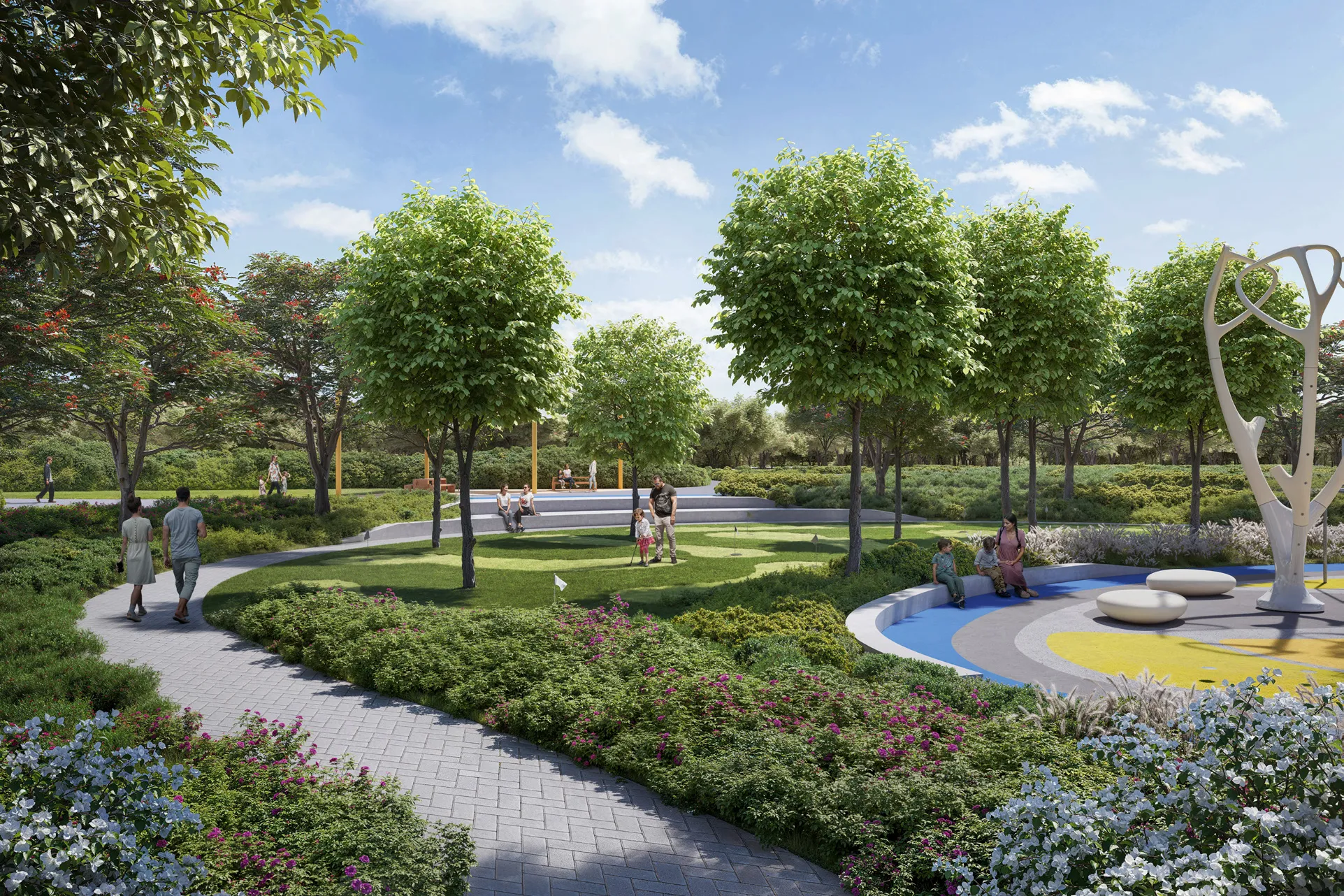 Winding garden path through flowering planting, lawns and trees in the park