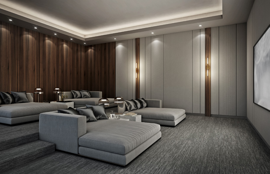 Cinema room with deep grey sofas and walnut-panelled walls
