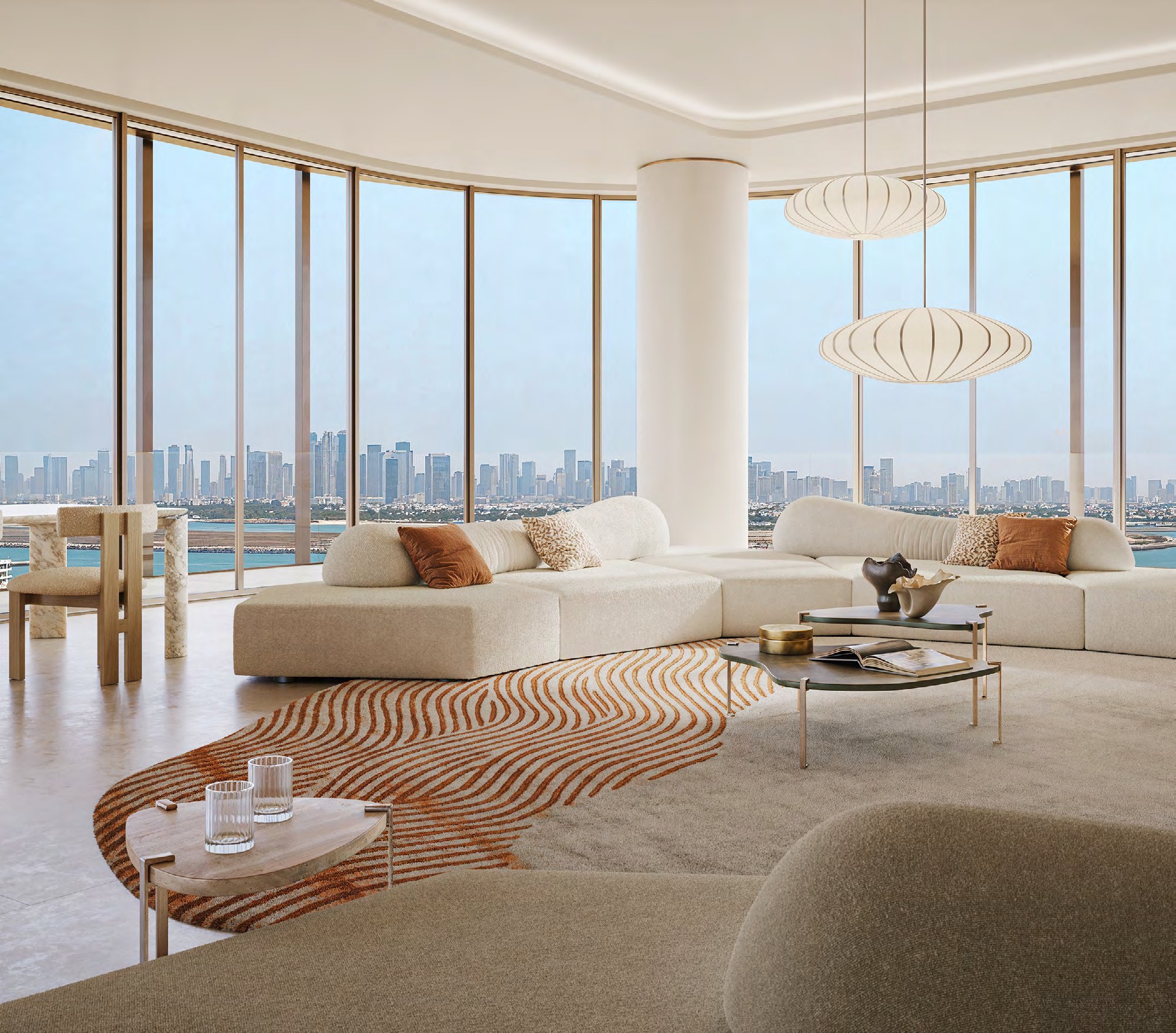 Curved living room with wraparound glazing and city skyline views