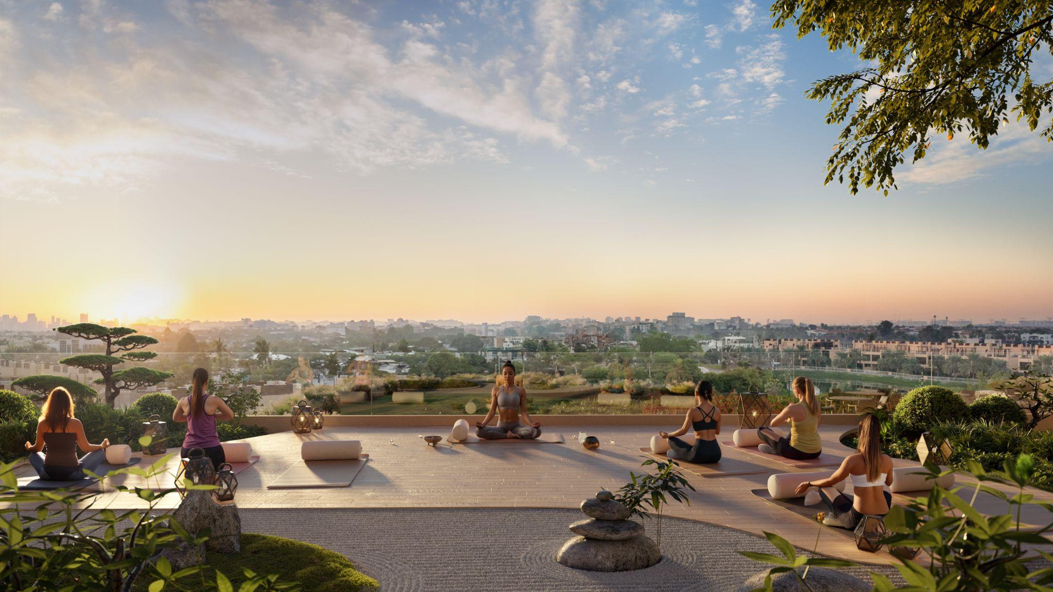 Yoga deck with a Japanese garden overlooking the city at sunrise