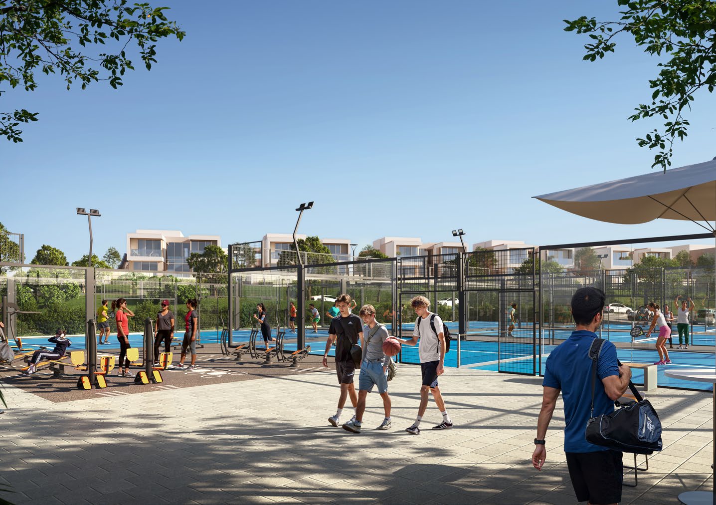 Padel courts and outdoor gym equipment at the sports hub