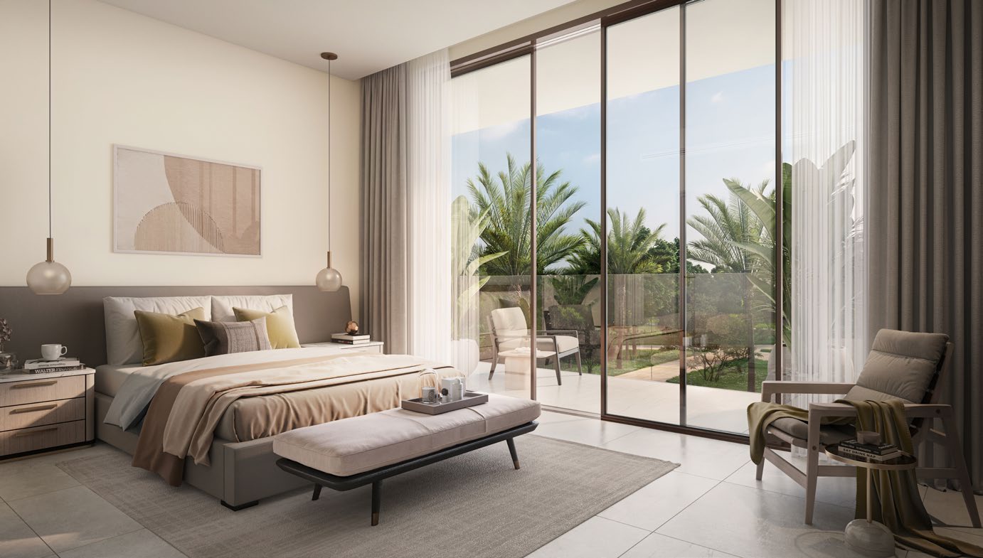 Bedroom with glass doors opening onto a balcony and palms