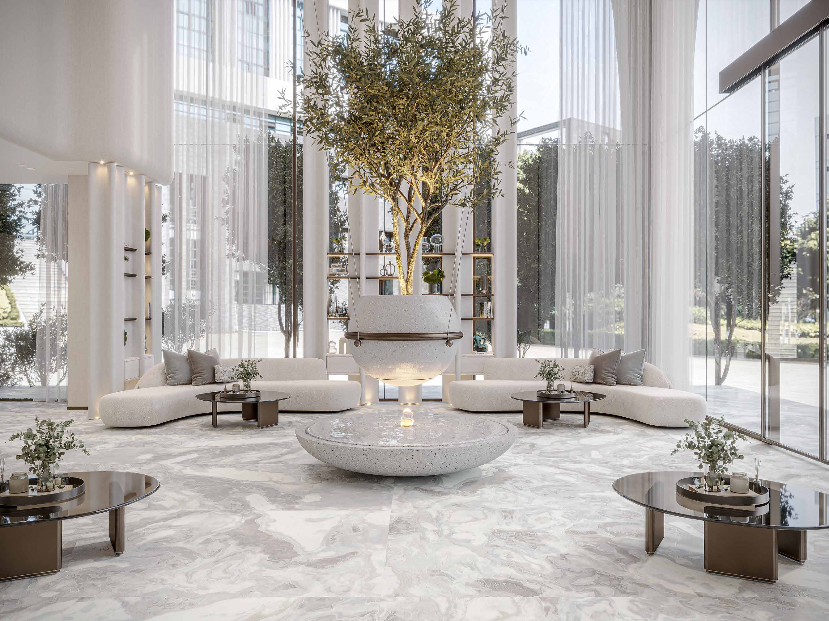 Bright lobby with curved white sofas, a central olive tree and sheer curtains