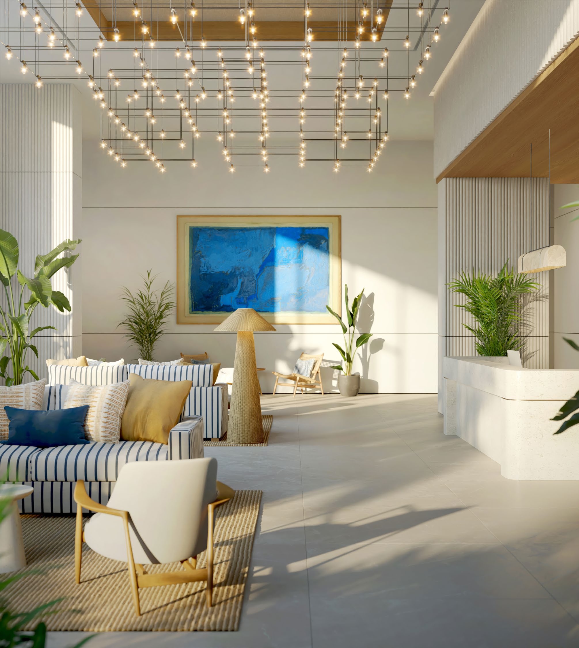 Bright lobby lounge with striped sofas, plants and a blue painting