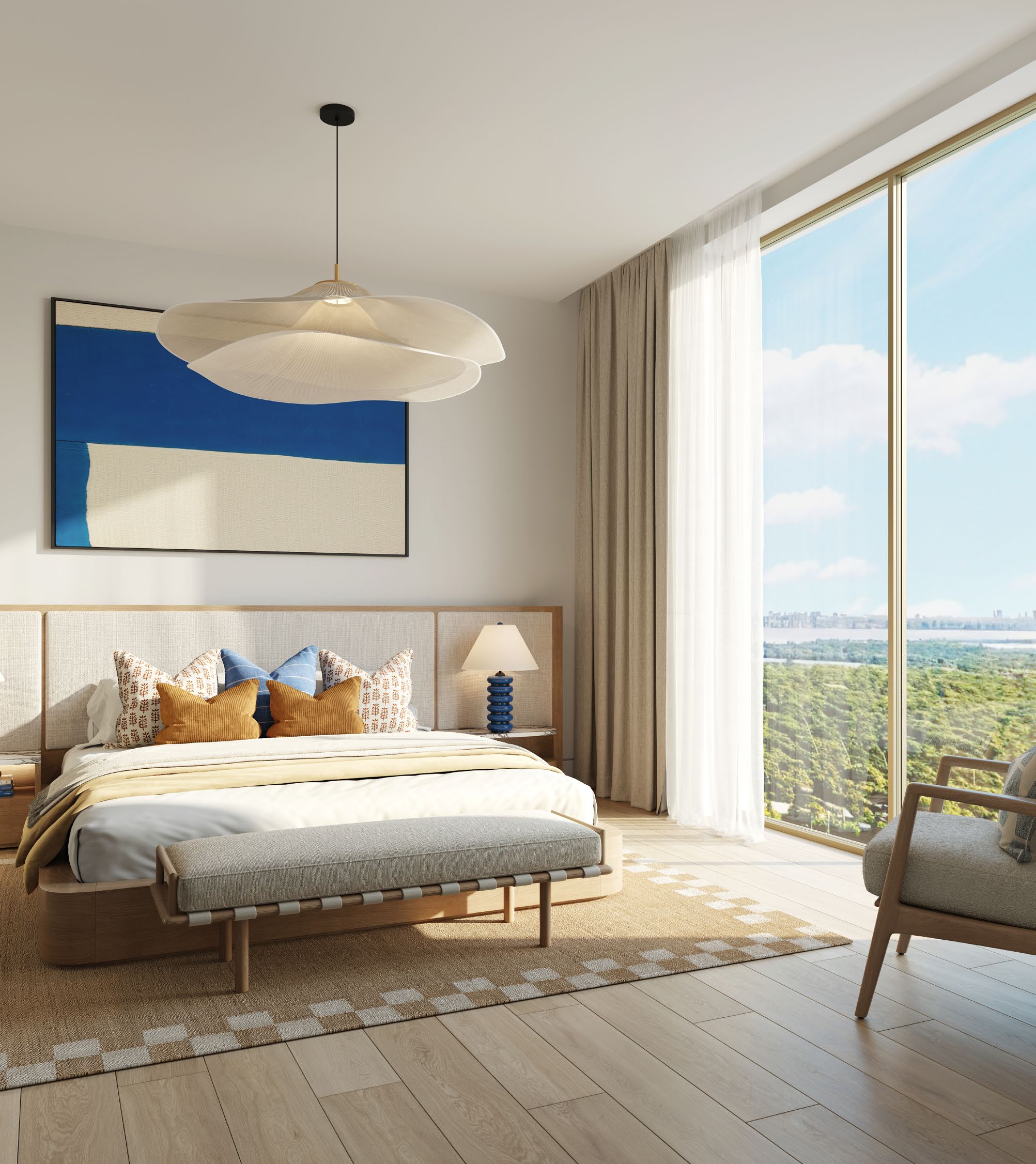 Main bedroom with tall windows looking over greenery towards the city