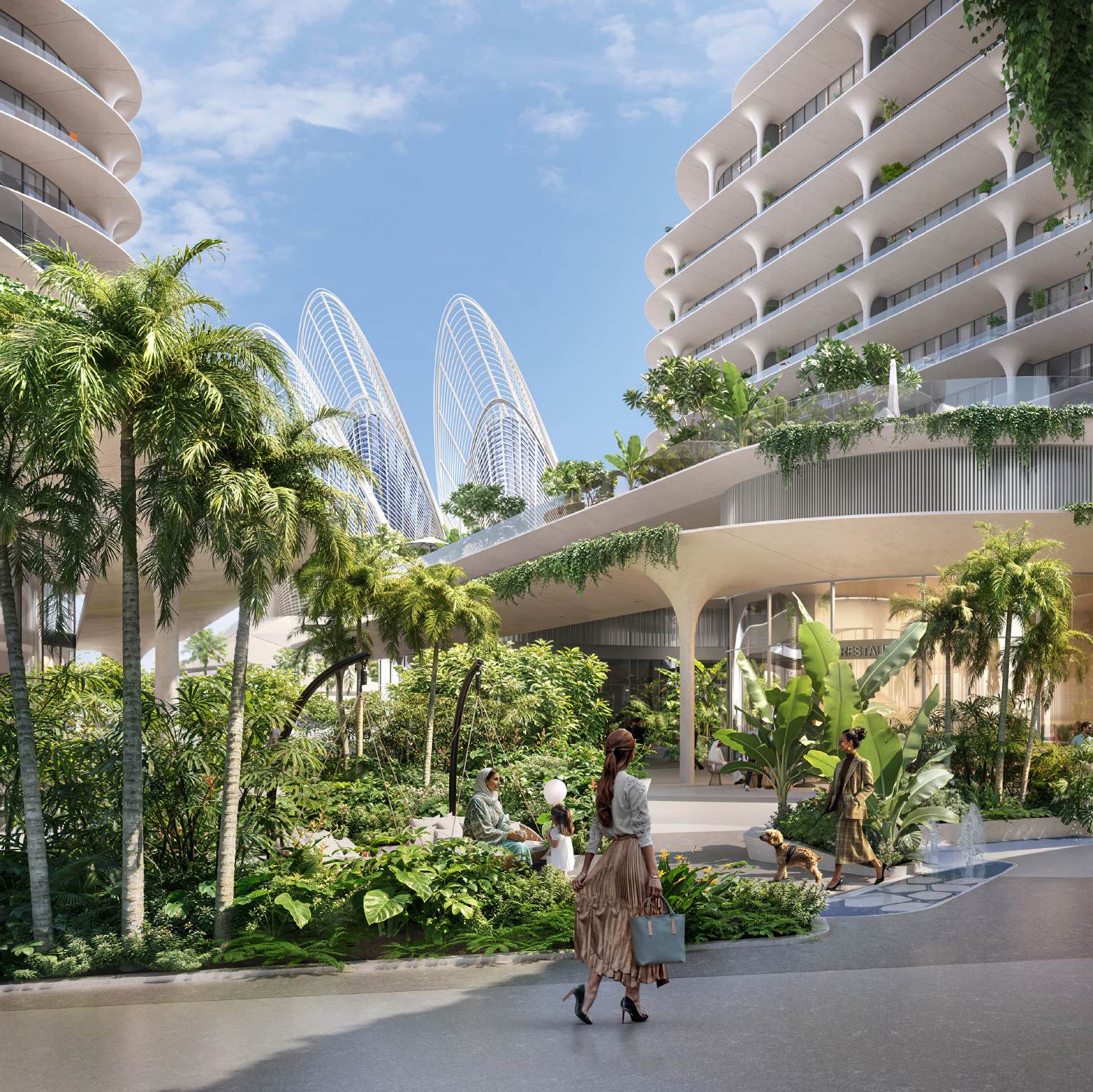 Palm-lined garden path beneath the curving balconies of The Row