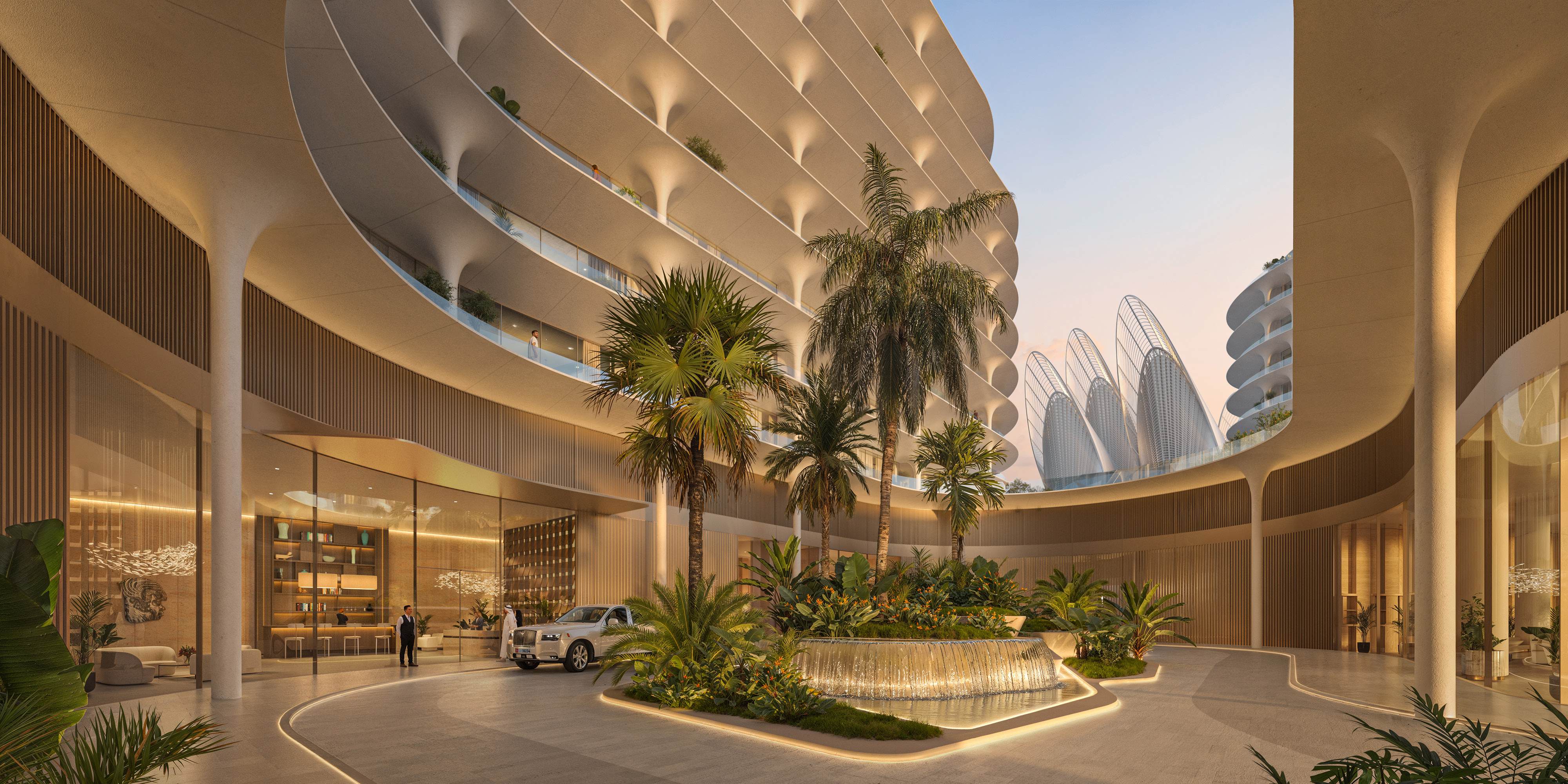 Arrival court with fountain and palms beneath The Row's curved balconies