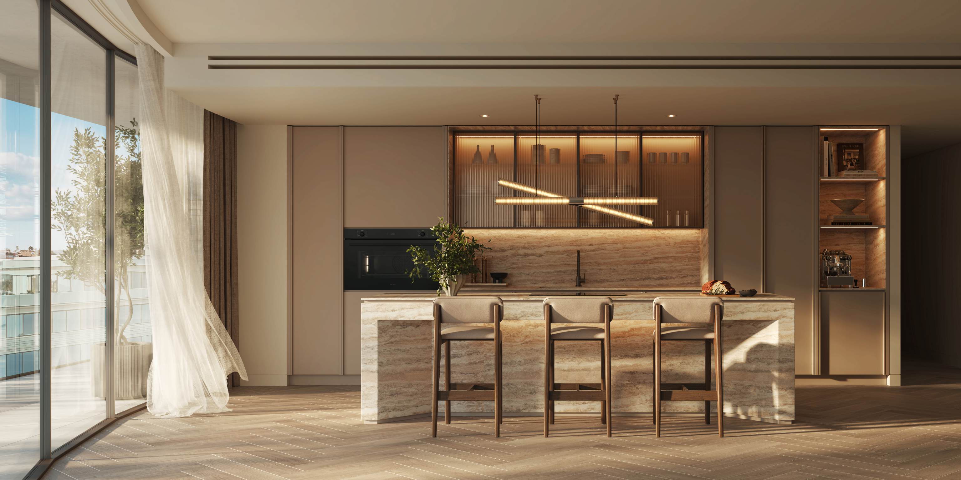 Kitchen with travertine island, fluted glass cabinets and three bar stools