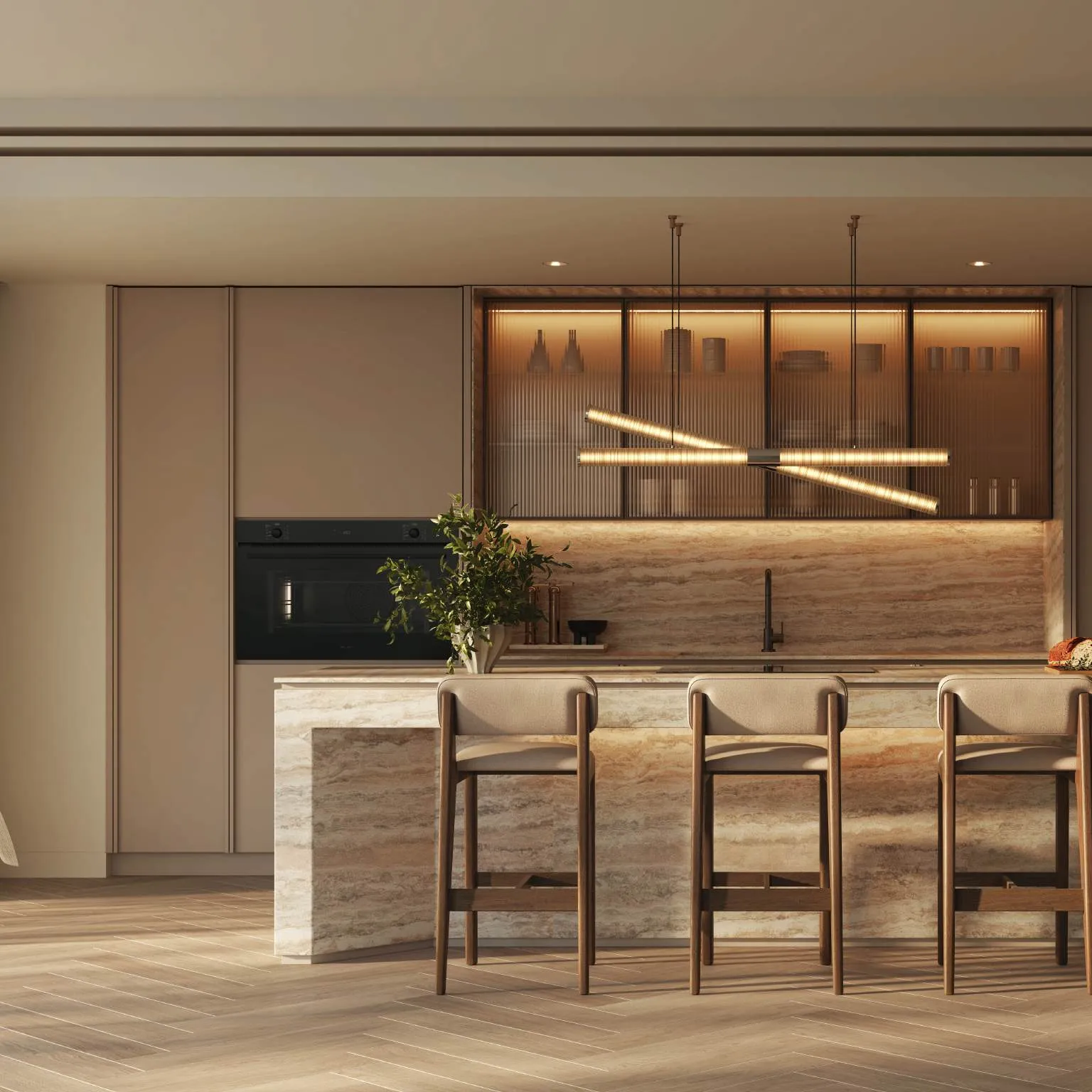 Kitchen with travertine island, fluted glass cabinets and three bar stools