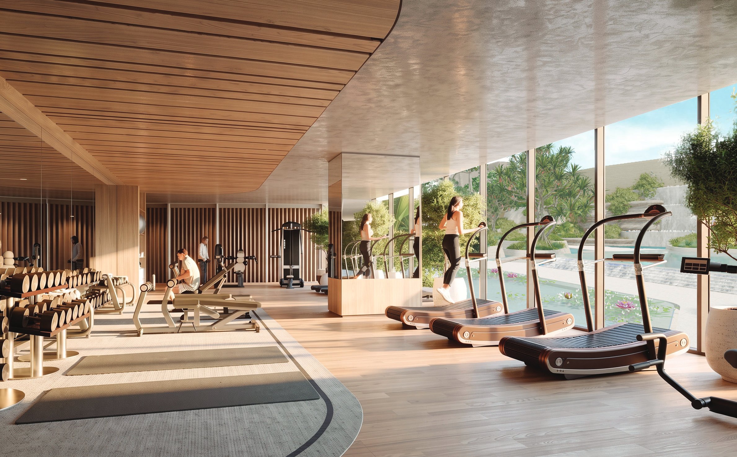 Glass-walled gym with treadmills and wood ceiling overlooking the gardens