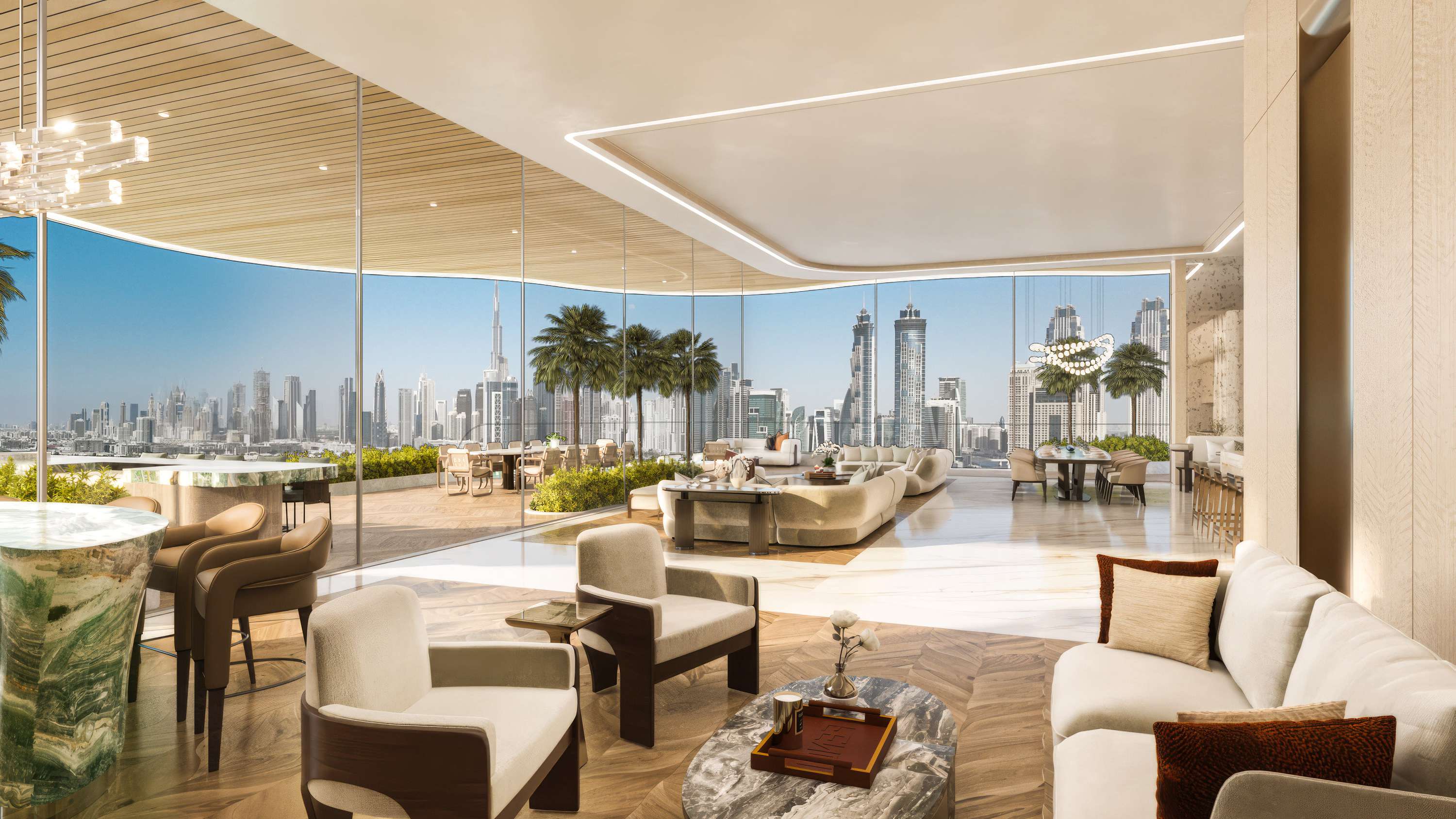 Lounge with curved glass walls looking out to the Downtown skyline