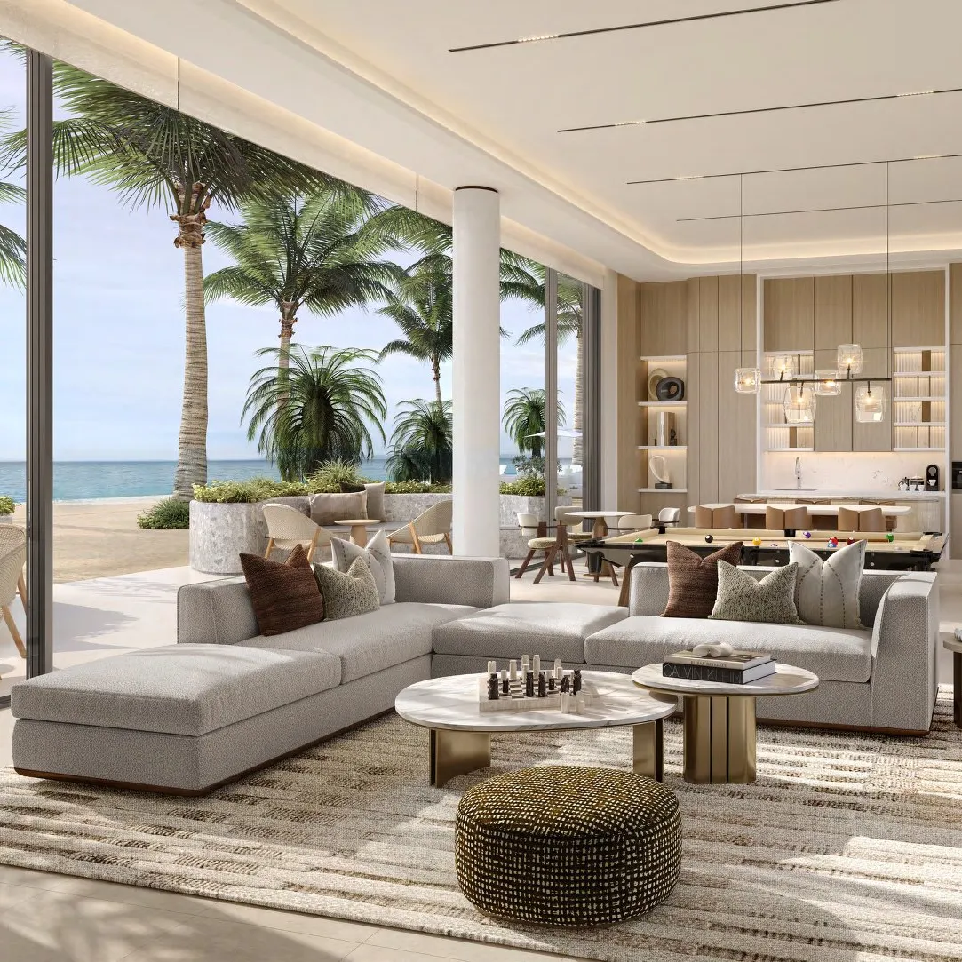 Lounge with sofas and a pool table opening onto the beach