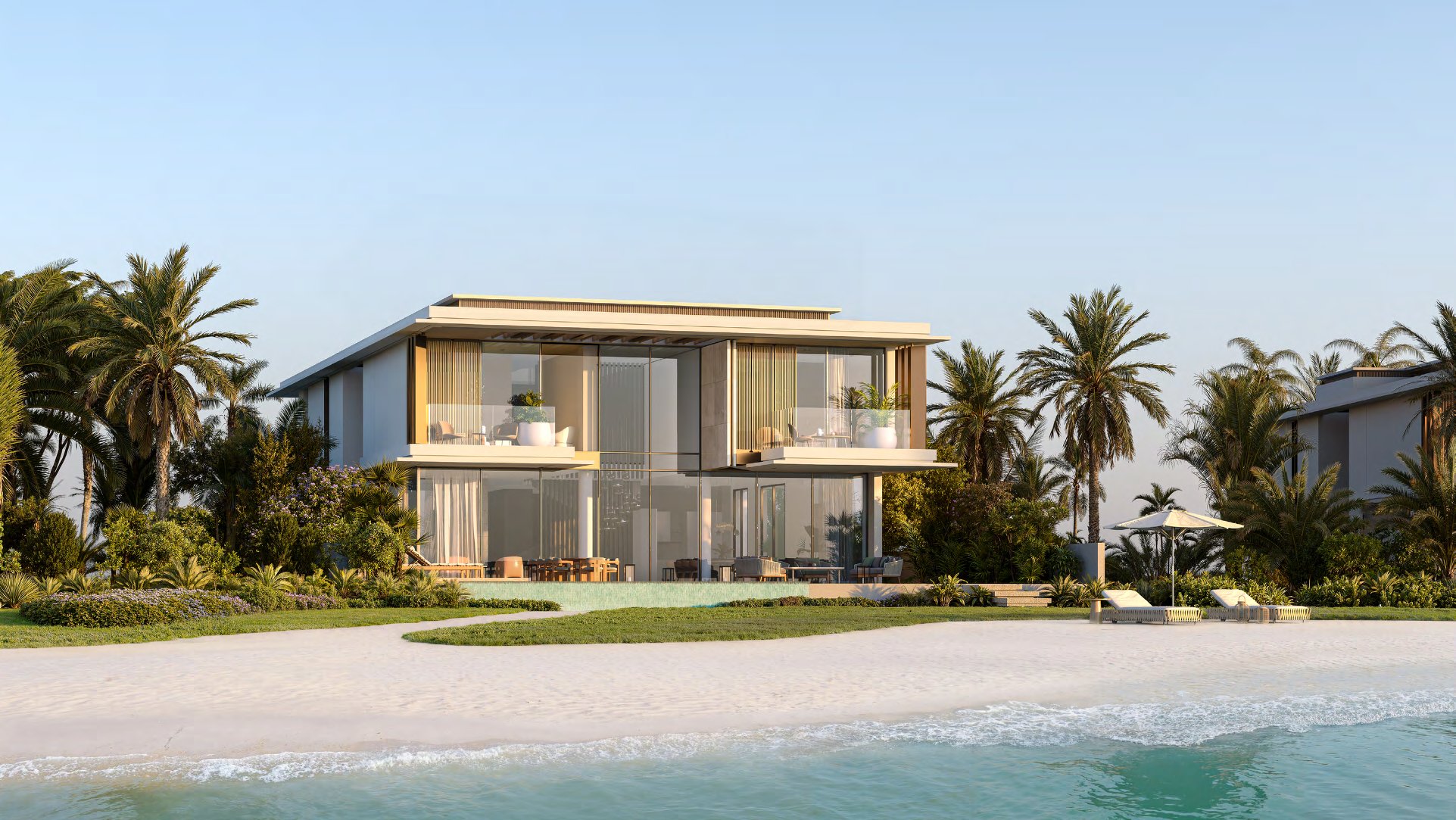 Reference design villa with glass facade and pool facing the beach