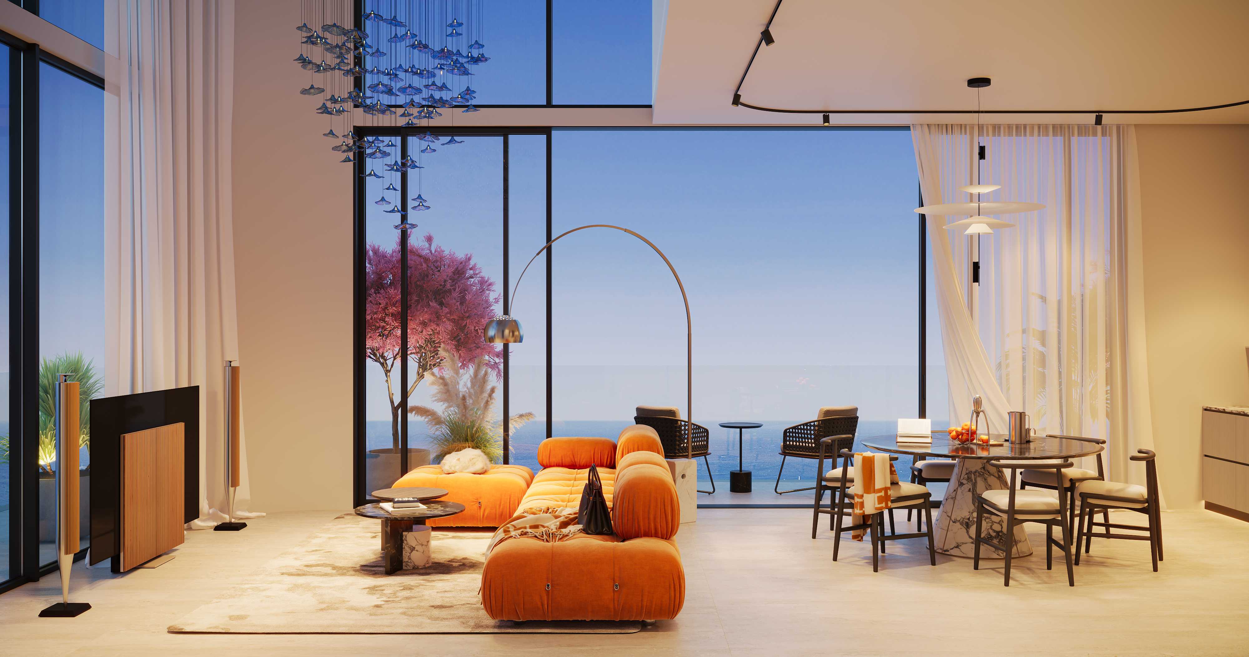 Double-height living room with orange sofa and floor-to-ceiling sea-view windows
