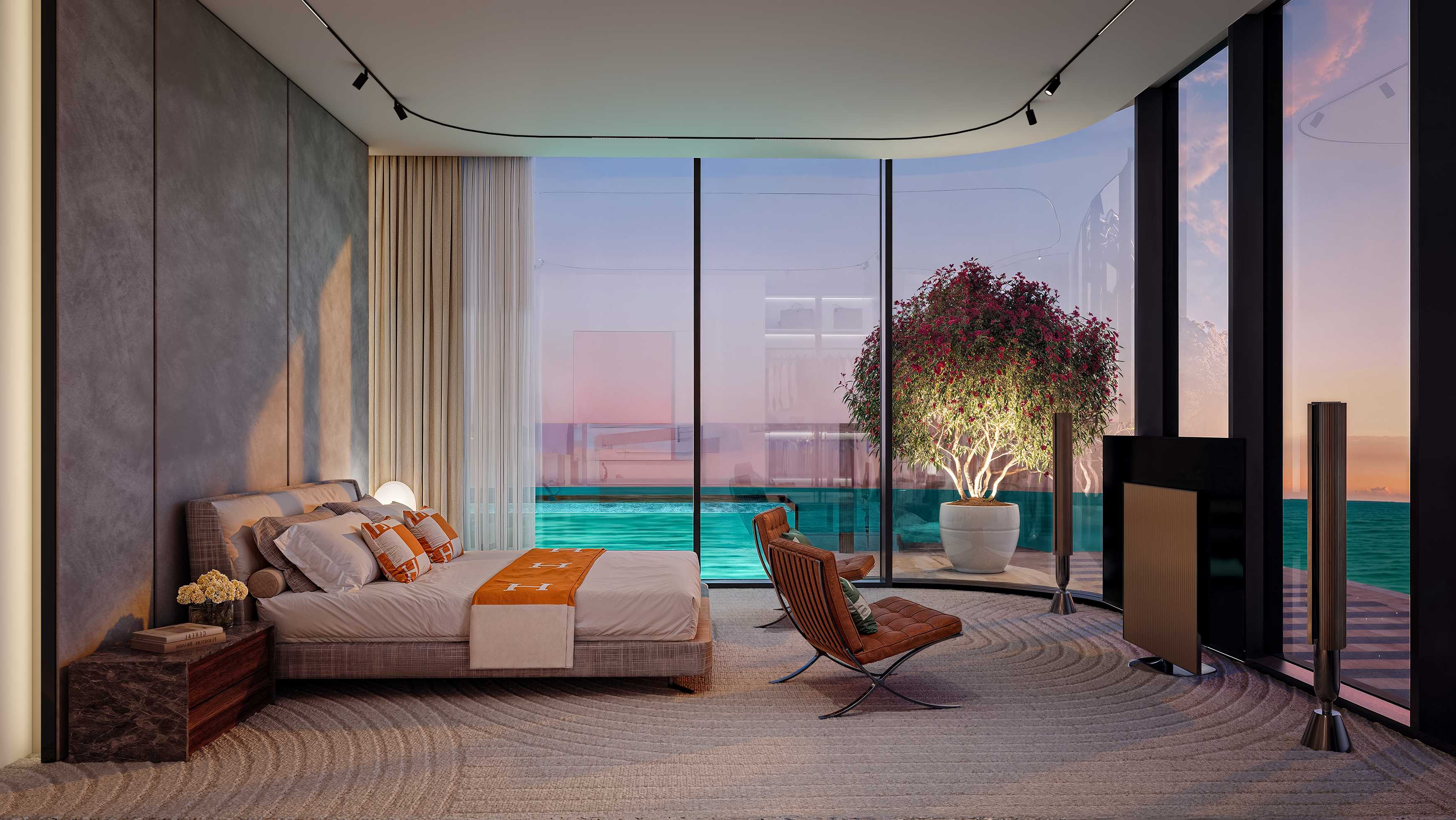 Bedroom with curved glass wall, potted tree and pool beyond