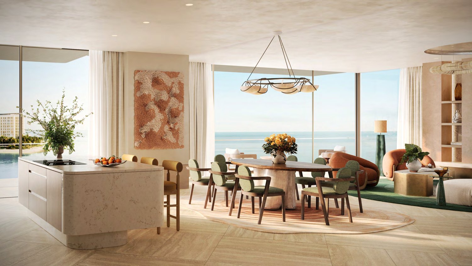Open kitchen island and dining table facing wide sea views