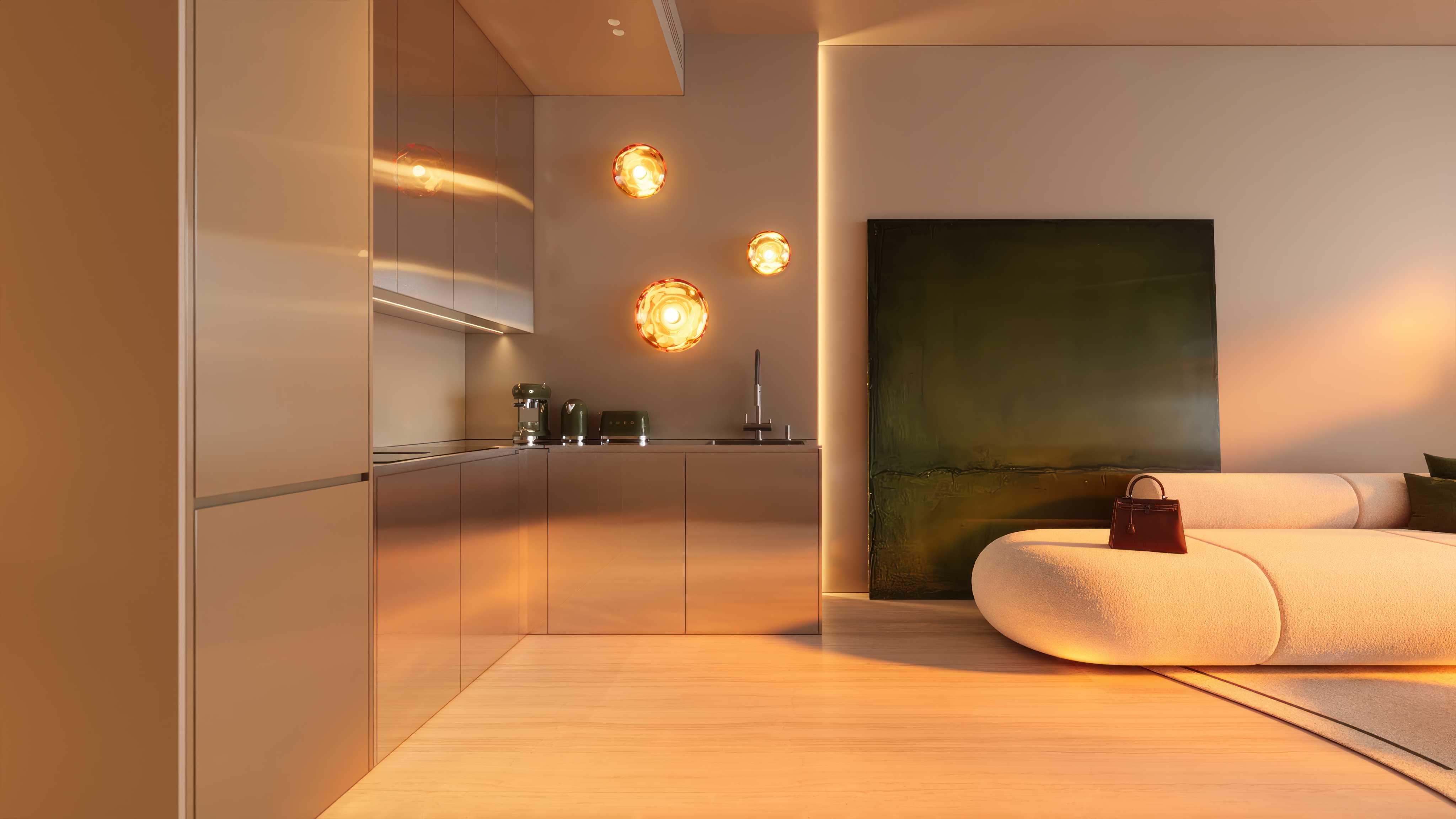 Warm living room with cream sofa beside a steel Italian kitchen