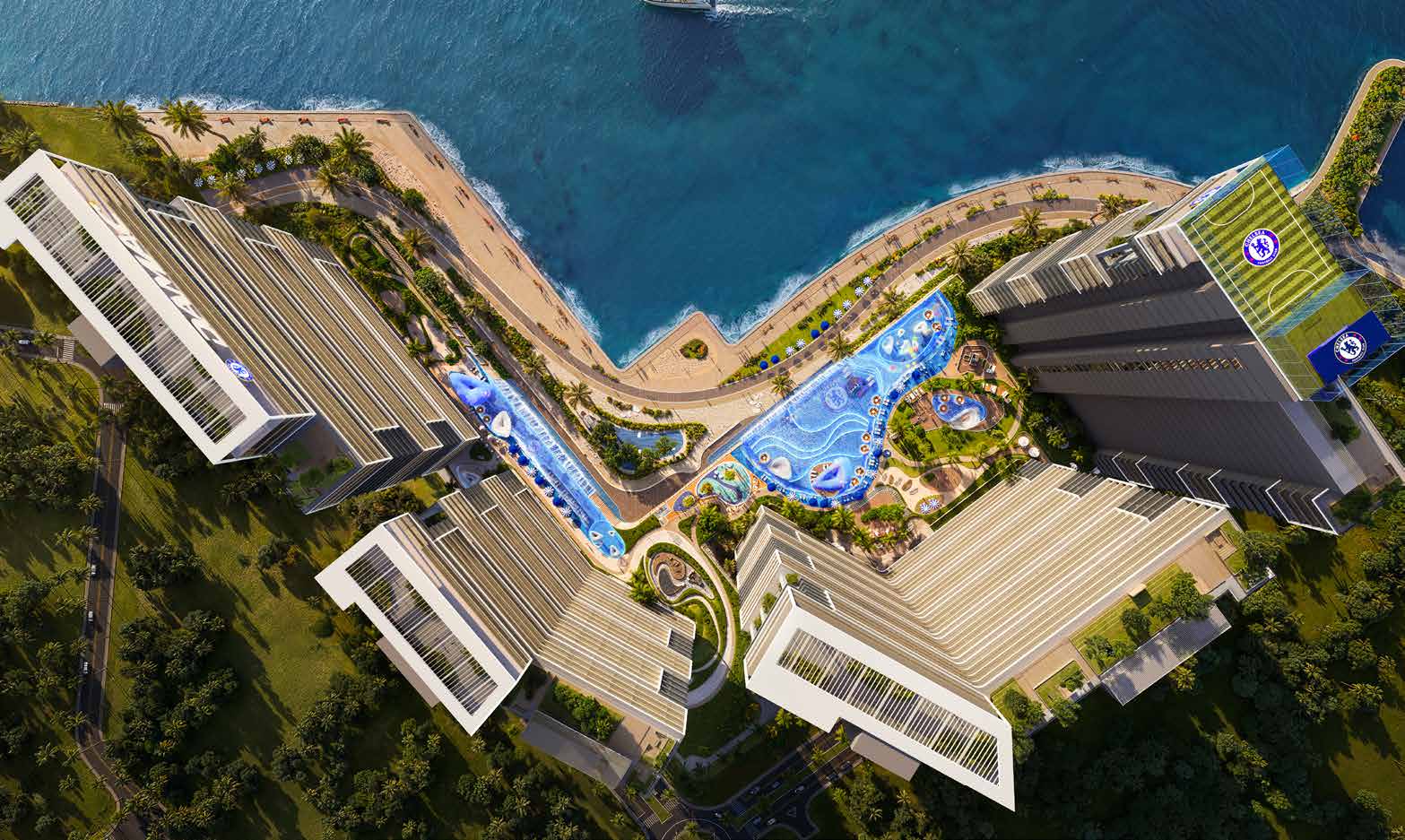 Aerial view of the six towers, pools and the seafront promenade