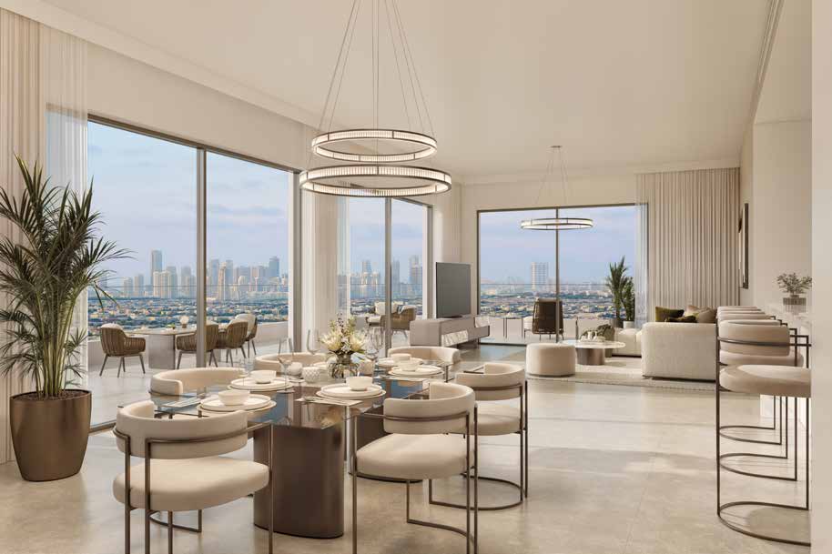 Open kitchen with marble island beside a long dining table