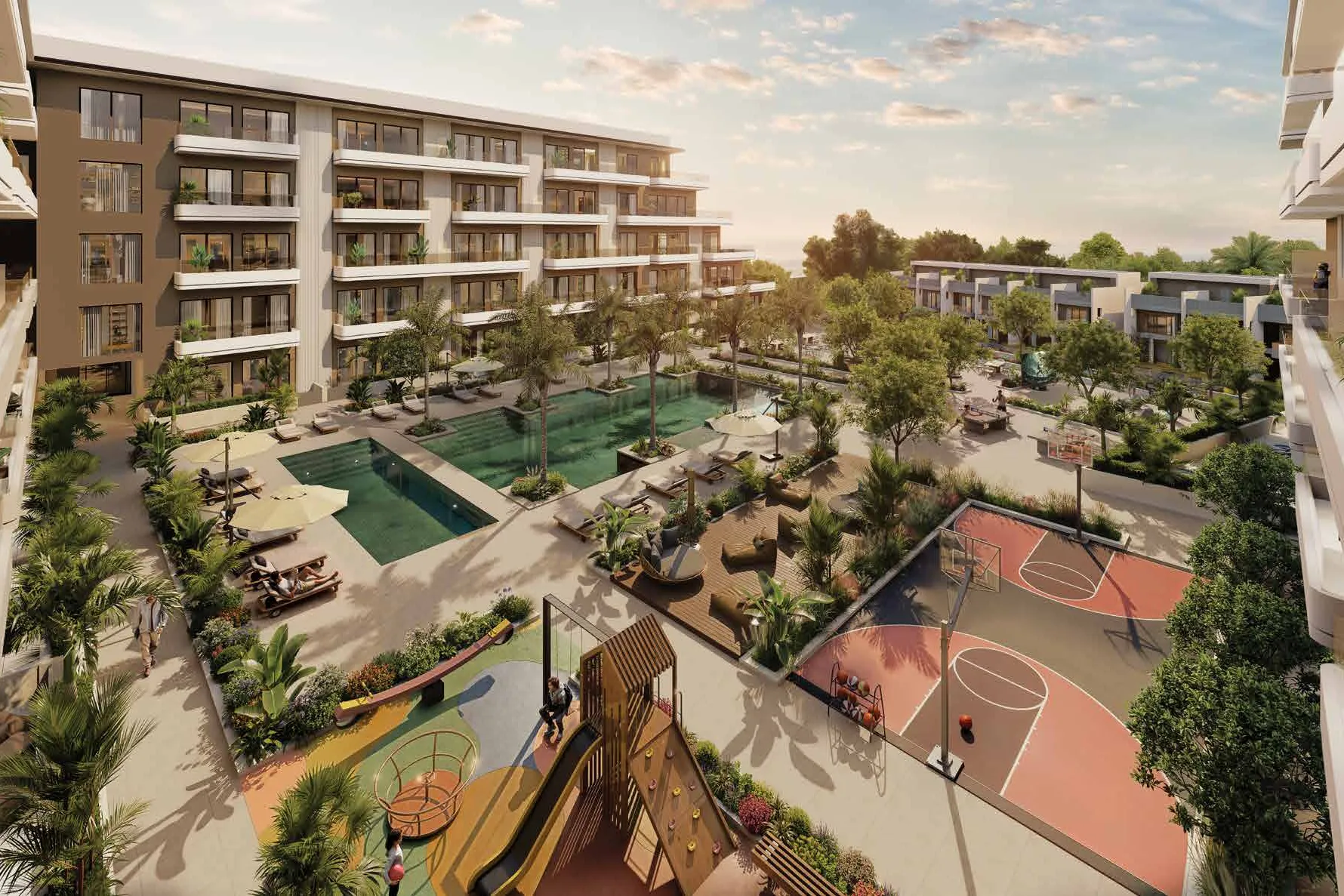 Courtyard with pools, sun loungers, basketball court and children's playground