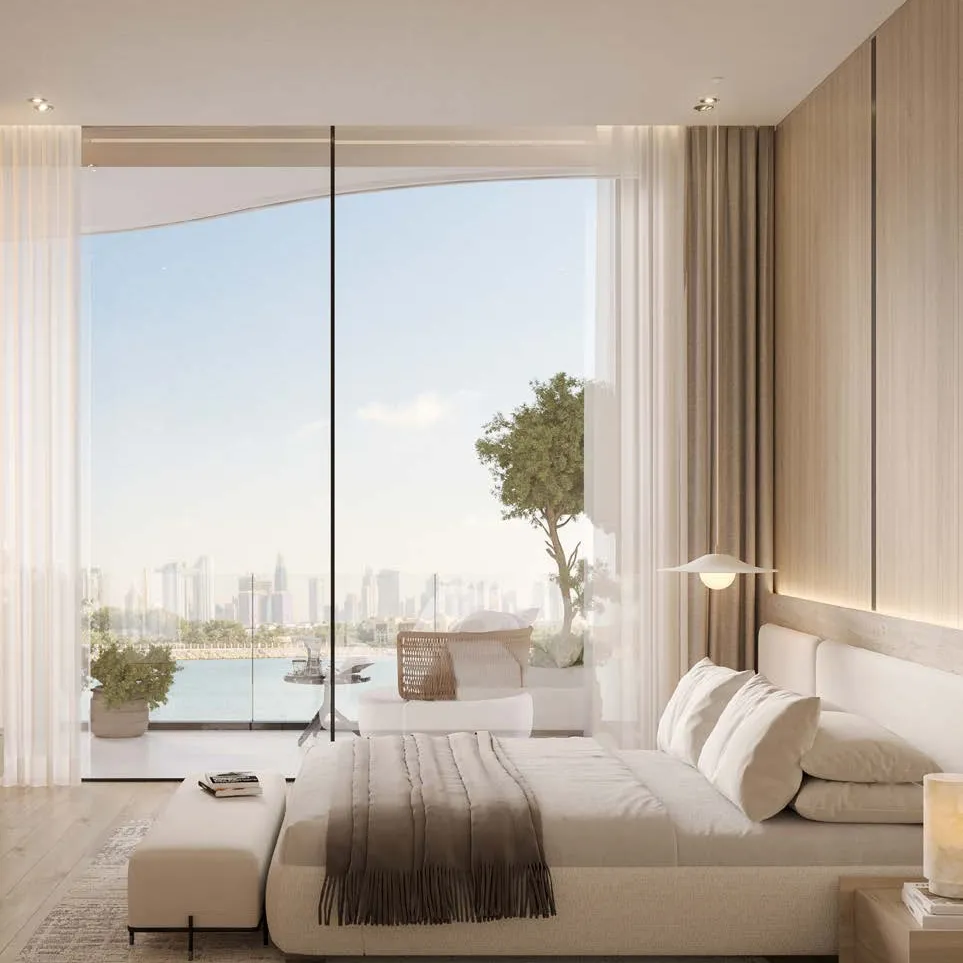 A bedroom and lounge facing the sea