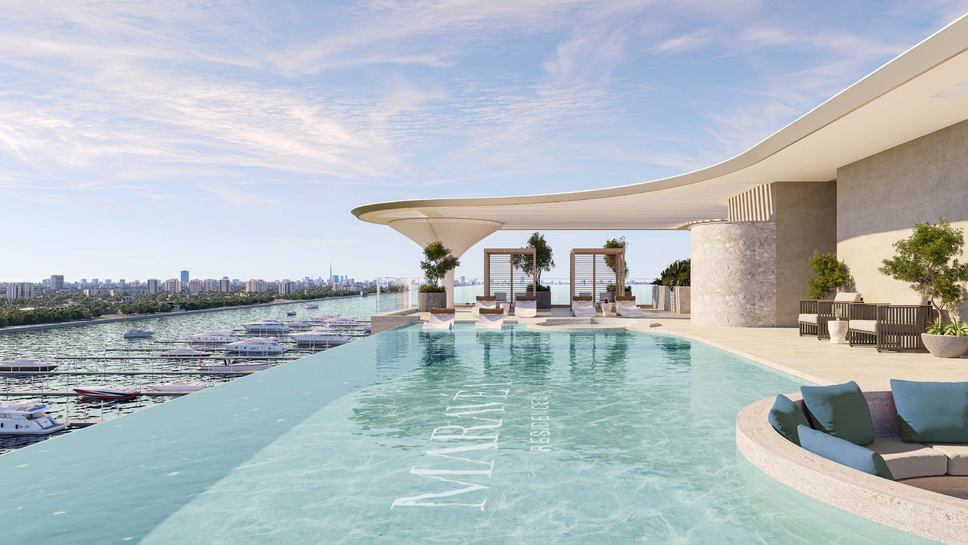 The rooftop infinity pool at Maravéa Residences, looking over the marina
